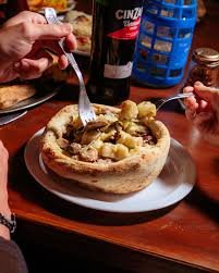 Llega una nueva edición de la noche de la pizza y la empanada